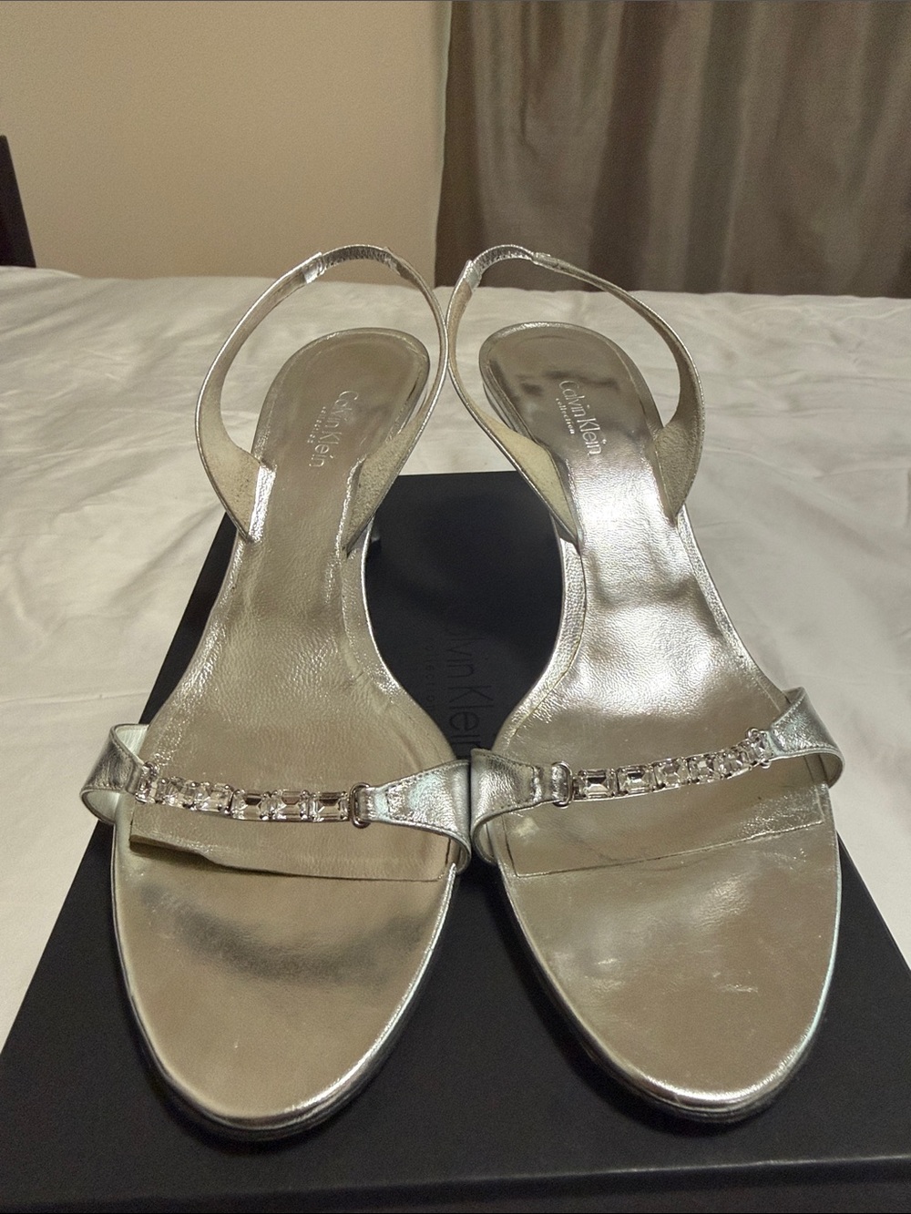 Calvin Klein Collection Metallic Silver Slingback 3”Heels with Rhinestone Strap.
